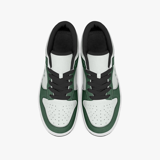 Overhead view of forest green and white sneakers displaying black laces, black padded collar lining, and perforated white leather toe boxes.