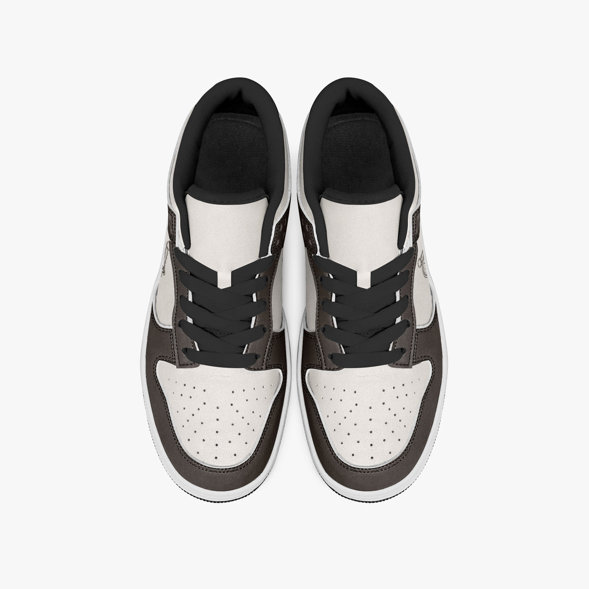 Overhead view of brown and cream sneakers displaying black laces, black padded collar lining, and perforated cream leather toe boxes.