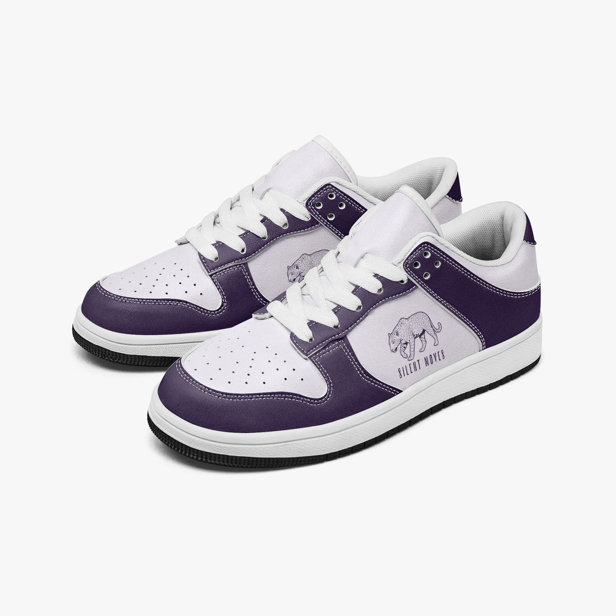 Angled three-quarter view of low-top sneakers in deep purple and white leather, featuring a panther graphic with "SILENT MOVES", white laces, and a white inner lining.