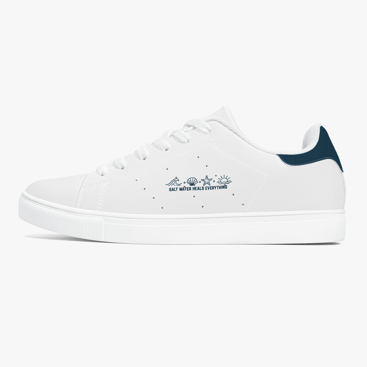 A white low-top sneaker with a dark navy heel tab and a navy graphic on the side reading 'SALT NEVER HIDE EVERYTHING' with small star and mountain illustrations. The shoe is shown in a clean profile view against a solid white background.