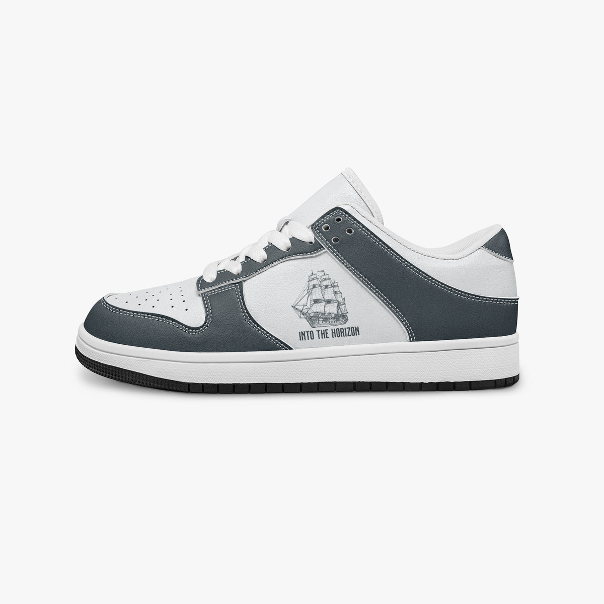 Side profile view of the left sneaker highlighting the slate blue-grey leather overlays, tall ship emblem, white laces, white interior lining, and contrasting black outsole facing right.