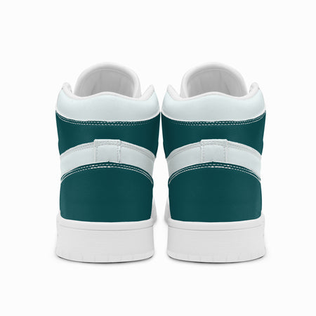 Rear view of dark teal and white high-top sneakers displaying dark teal heel counters, white collar bands, and two-tone white and dark grey rubber outsoles.