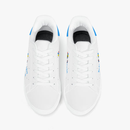 White sneakers with blue accents on a white background