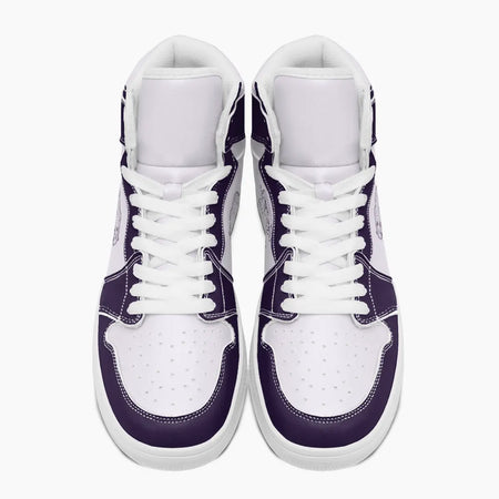 Overhead top-down view of high-top sneakers highlighting deep purple eyestays, white lacing, and perforated white leather vamps.
