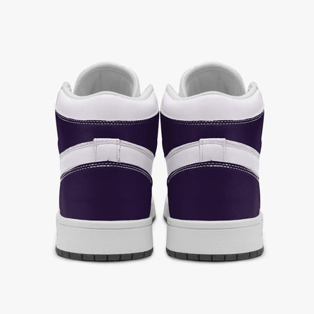 Rear view of purple and white high-top sneakers displaying dark purple heel counters, white collar panels, and clean white rubber midsoles above dark outsoles.