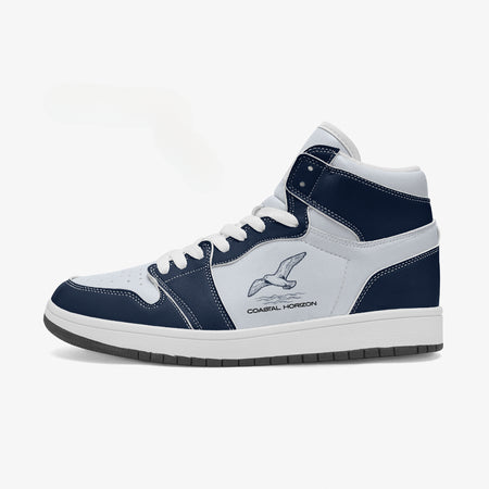 Side profile view of the left high-top sneaker in navy blue and white leather, highlighting the "COASTAL HORIZON" seagull emblem, white collar lining, and solid rubber outsole facing right.