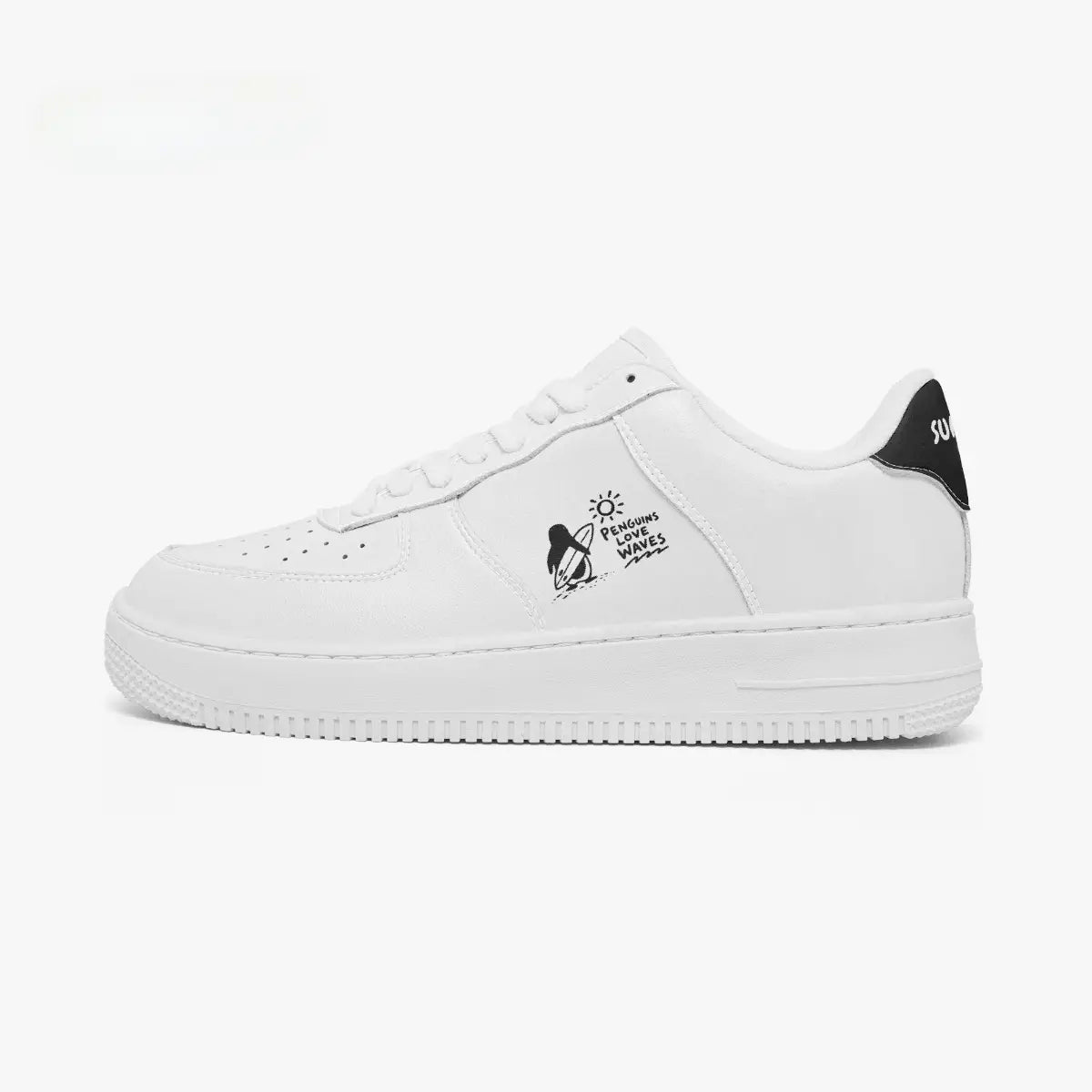 Outer side view of the left sneaker in white leather, highlighting the surfing penguin graphic and black heel accent facing left.