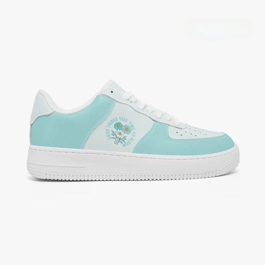 Outer side view of the right shoe in mint green and white, highlighting the floral bouquet illustration and thick white midsole.