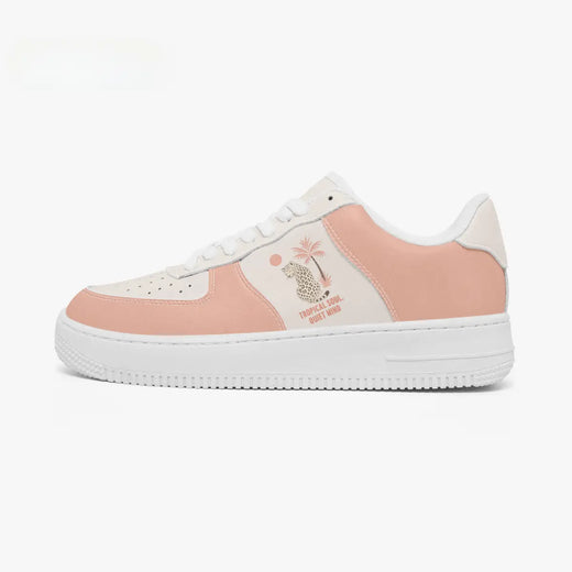 Outer side view of the left sneaker in dusty peach and cream, displaying the tropical leopard illustration facing left.