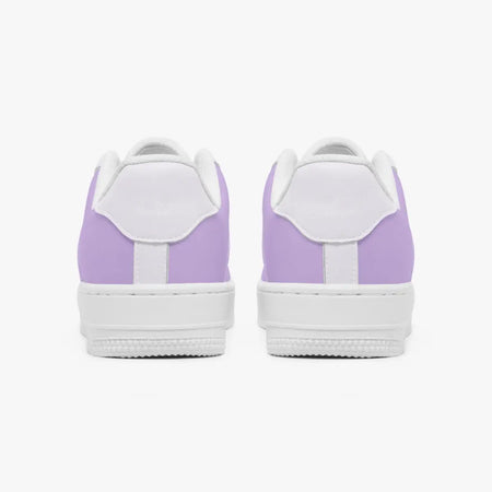 A pair of low-top sneakers shown from the back, featuring light purple uppers and white midsoles and laces, set against a plain white background.