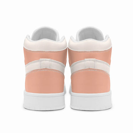 Rear view of high-top sneakers displaying dusty peach heel panels, off-white padded collars, and white rubber outsoles.