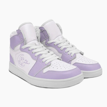 Angled three-quarter view of lavender and white high-top sneakers featuring a cat on a crescent moon graphic with "stay pawsitive" printed on the side.