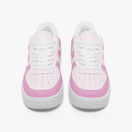 A pair of low-top sneakers shown from the front on a light gray background. The shoes are primarily white with light pink overlays and white laces.