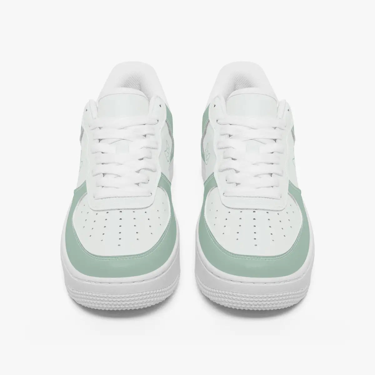 A pair of white low-top sneakers with mint green side panels and matching green trim around the midsole, shown from a front-facing perspective on a light gray background.