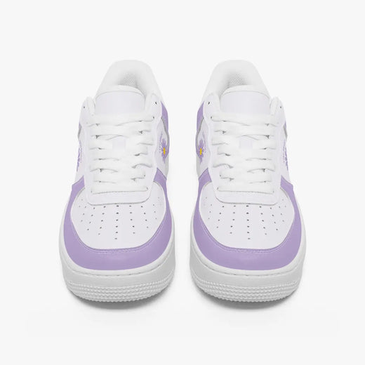 A pair of white low-top sneakers with light purple side panels and matching purple accents on the midsoles, shown from a front-facing perspective on a clean white background.