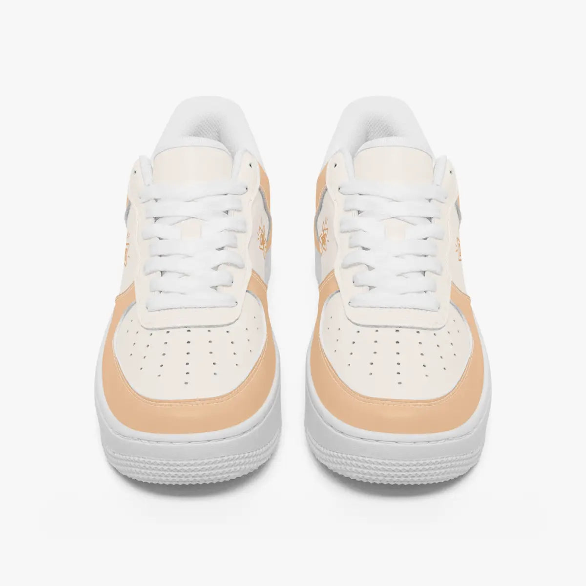 A pair of low-top sneakers shown from the front on a light gray background. The shoes are primarily white with a warm peach-beige accent panel around the midfoot and toe area.