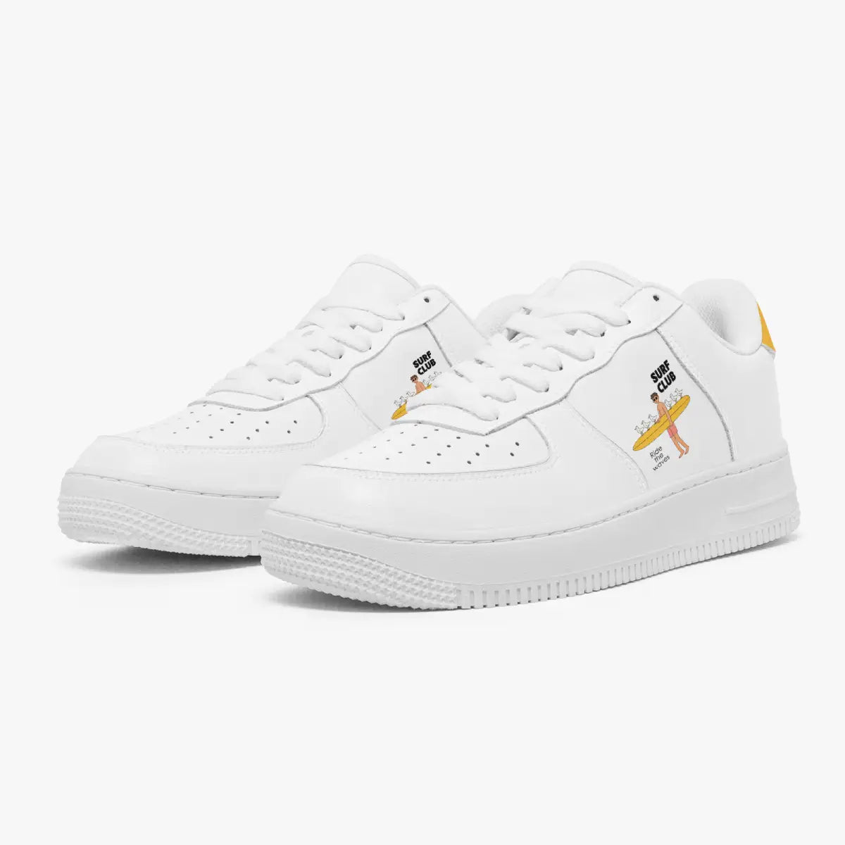 Angled three-quarter view of white leather sneakers featuring a cartoon surfer illustration with "SURF CLUB" and "Ride the waves" on the side panel.