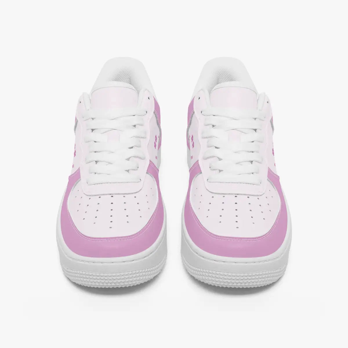 A pair of white low-top sneakers with light pink side panels and matching pink accents on the toe and heel, shown from a front-facing perspective on a clean white background.