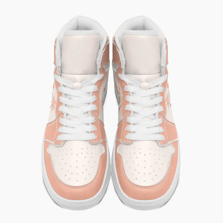 Overhead front view of high-top sneakers in dusty peach and cream leather with white laces and perforated toe boxes.