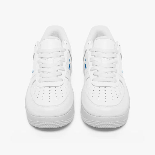 A pair of white low-top sneakers shown from the front on a clean white background.
