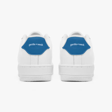 A pair of white low-top sneakers shown from the back, featuring a prominent blue heel tab with the white text 'gentle = weak'.
