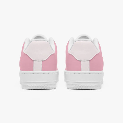Rear view of a pair of pastel pink low-top sneakers showing the light pink heel tabs and thick white rubber outsoles.