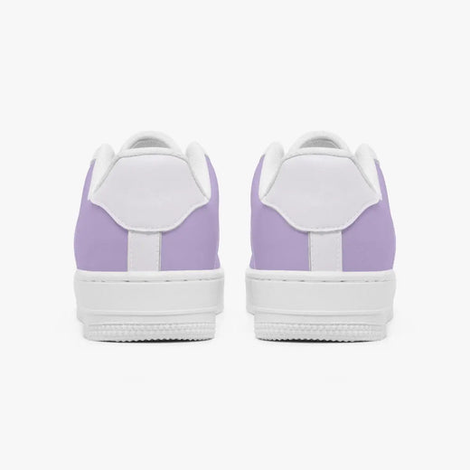 A pair of low-top sneakers shown from the back, featuring light purple panels and white overlays, set against a clean white background.
