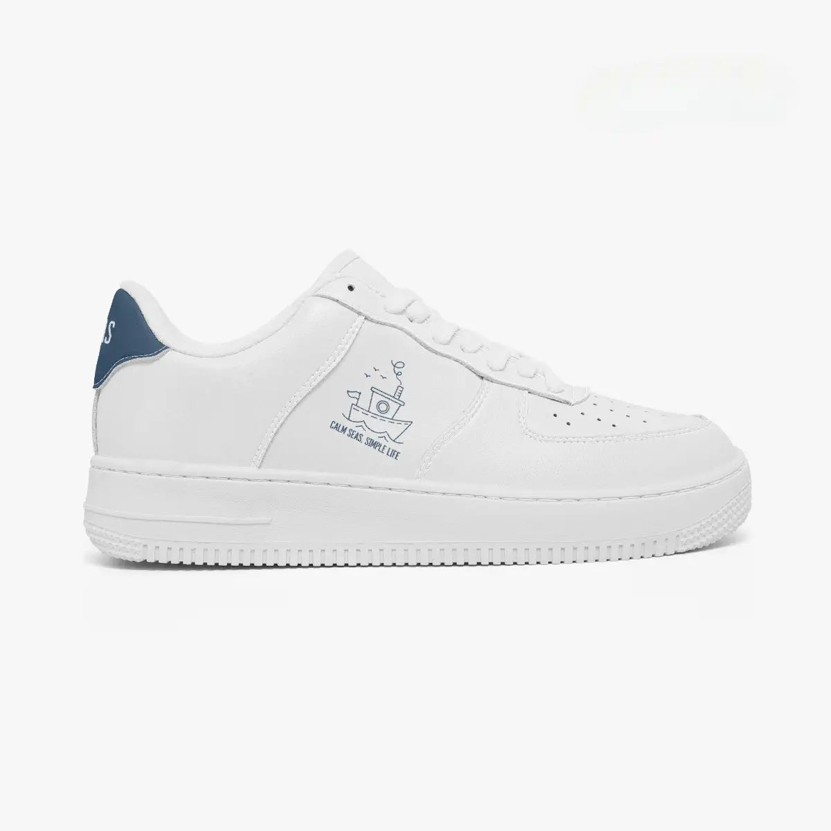 Side profile view of the right sneaker in white leather, highlighting the blue tugboat emblem and navy blue heel accent facing right.