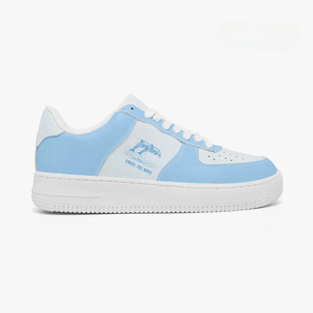 Side profile view of the right sneaker showcasing the sky blue overlays, jumping dolphin illustration, white eyestay trim, and flat white rubber sole facing right.