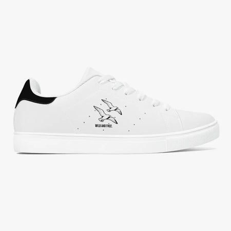 Side profile view of the right sneaker displaying the dual seagull graphic, black heel accent, tonal white stitching, and matching white sole facing right.