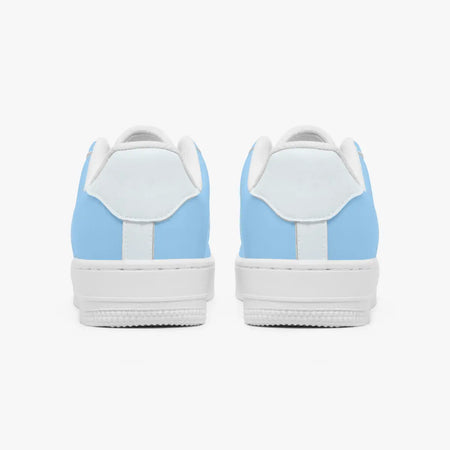 Rear view of sky blue and white sneakers displaying sky blue heel overlays, white leather collar tabs, and textured white rubber platform midsoles.