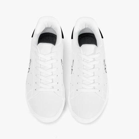 Overhead view of white leather sneakers showing clean white laces, white interior linings, and smooth white rounded toe boxes.