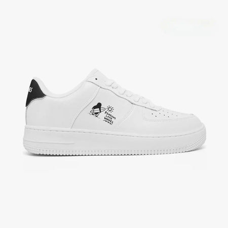 Outer side view of the right shoe in white, showing the minimal penguin illustration and thick textured rubber midsole facing right.