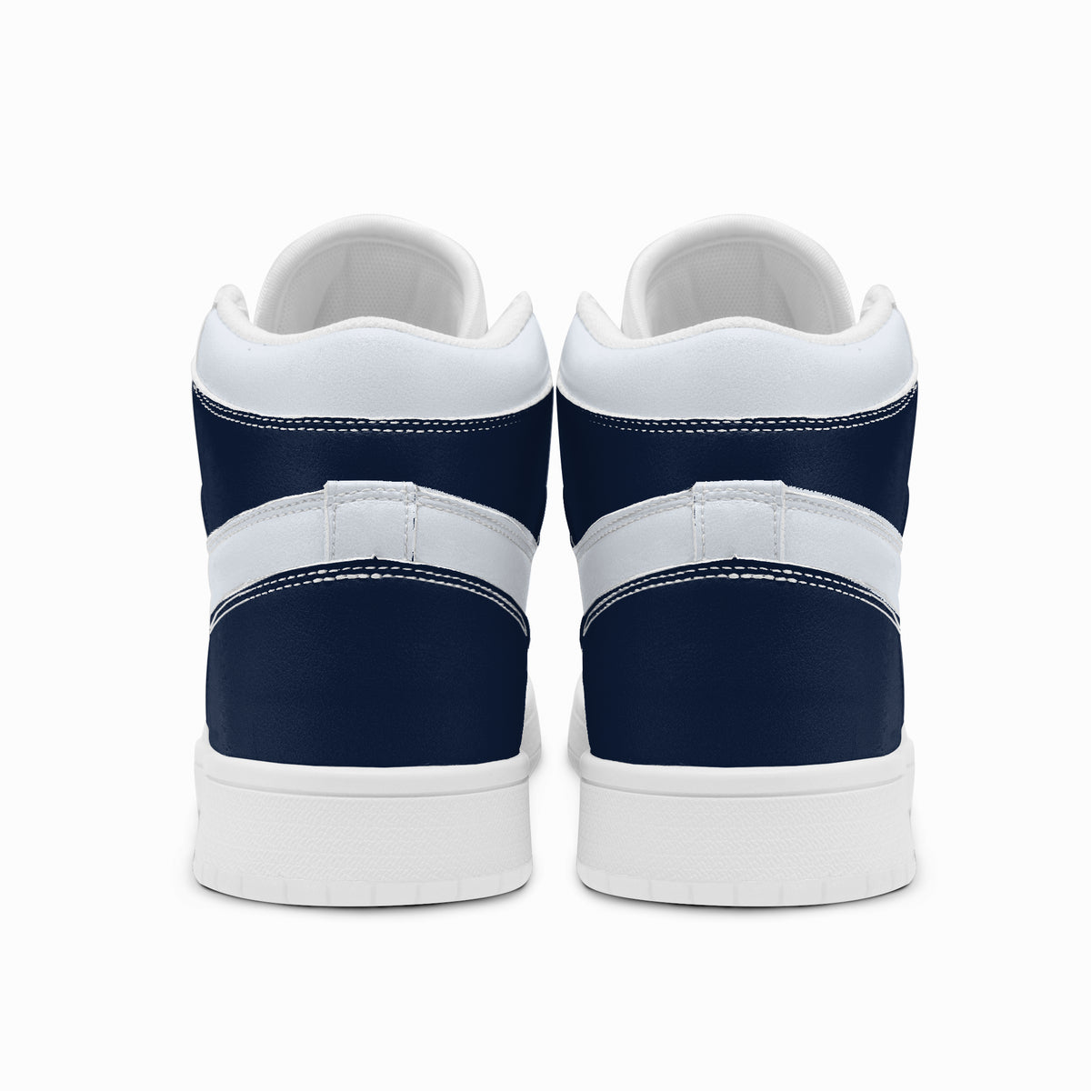 Rear view of navy blue and white high-top sneakers displaying dark navy heel counters, white collar bands, and two-tone white and dark grey rubber outsoles.