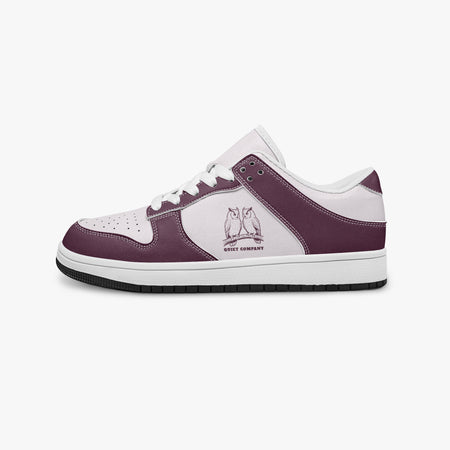 Side profile view of the left sneaker in burgundy and pale pink leather, highlighting the "QUIET COMPANY" owl design, white laces, white interior lining, and flat rubber sole facing right.