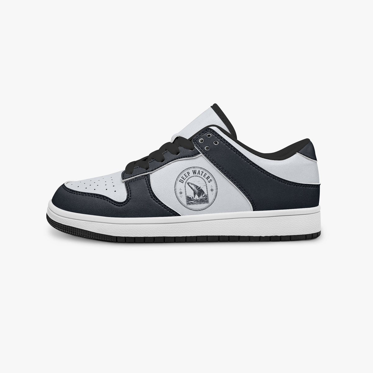 Side profile view of the left sneaker highlighting the navy leather panels, ocean wildlife emblem, black interior lining, and flat rubber sole facing right.