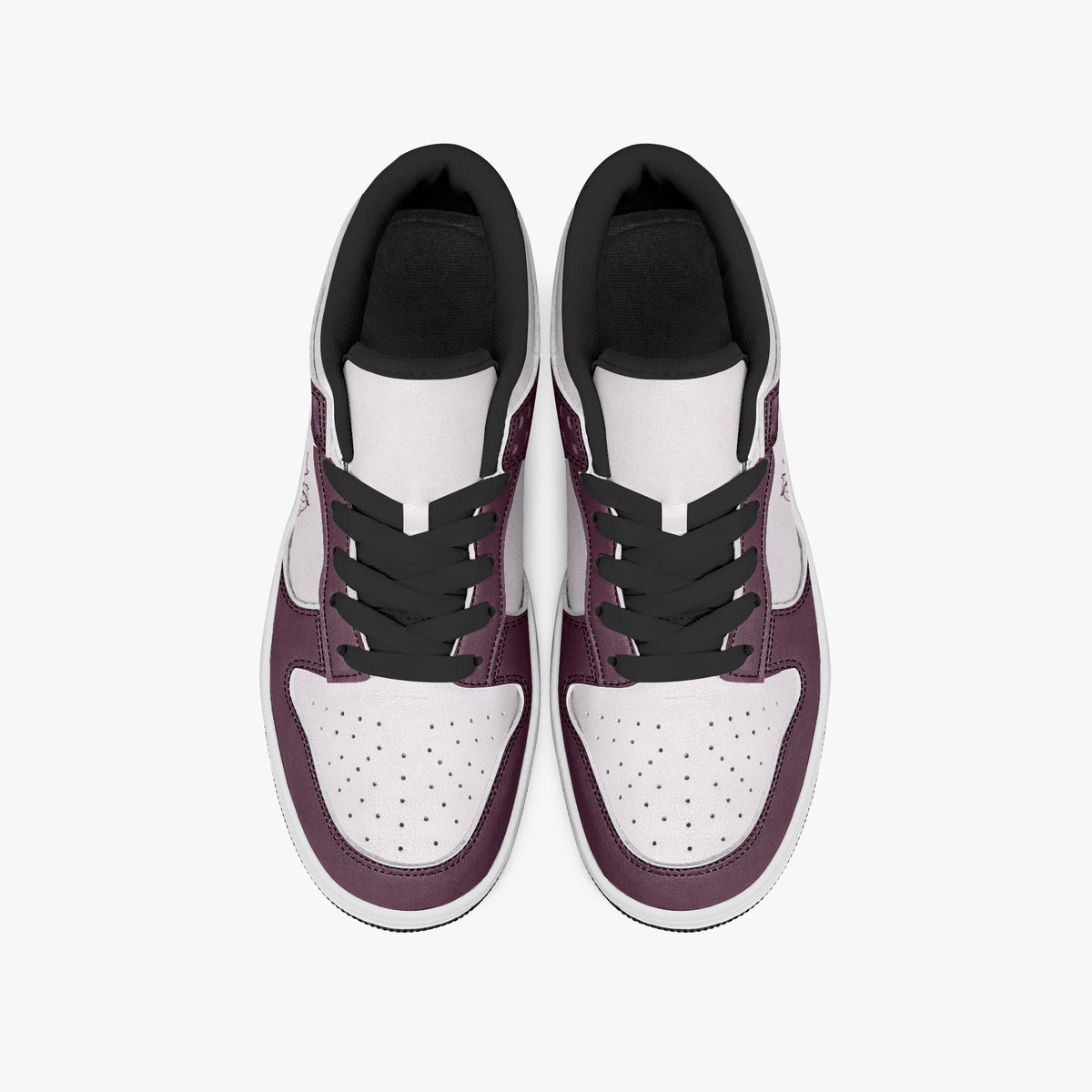 Overhead view of burgundy and pale pink sneakers displaying black laces, black padded collar lining, and perforated pale pink leather toe boxes.