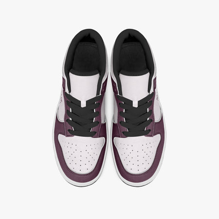 Overhead view of burgundy and pale pink sneakers displaying black laces, black padded collar lining, and perforated pale pink leather toe boxes.