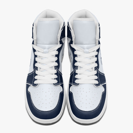 Overhead view of navy blue and white high-top sneakers showing clean white laces, white padded collar lining, and perforated white leather toe boxes.