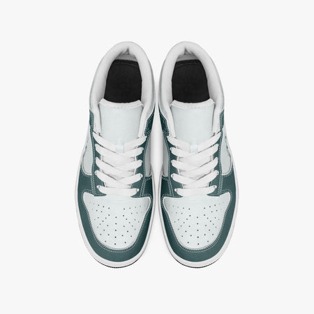 Overhead view of dark teal and white sneakers showing clean white laces, white padded collars, perforated toe boxes, and white leather uppers.