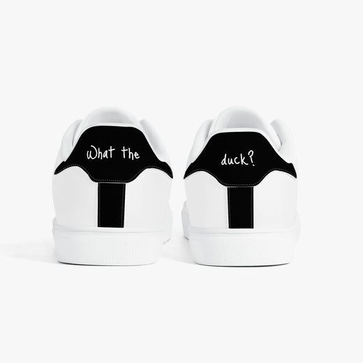 White sneakers with 'Emotionally tired.' text on a white background