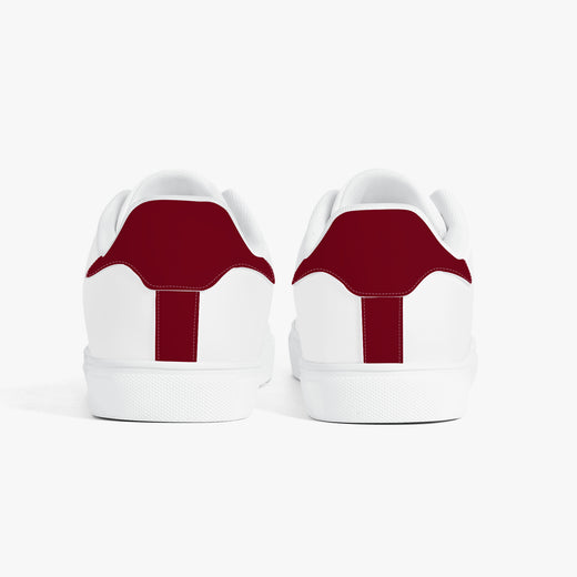 White sneakers with 'Emotionally tired.' text on a white background
