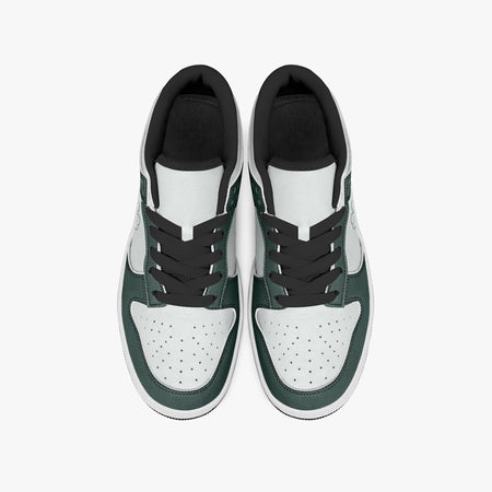 Overhead view of dark green and white sneakers displaying black laces, black padded collar lining, and perforated white leather toe boxes.