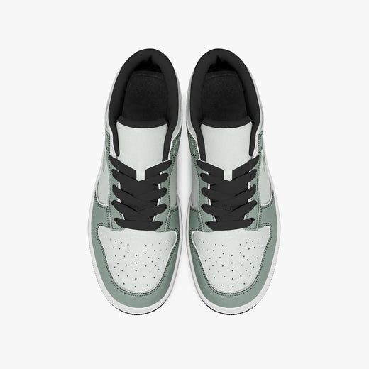Overhead view of sage green and off-white sneakers displaying black laces, black padded collar lining, and perforated off-white leather toe boxes.