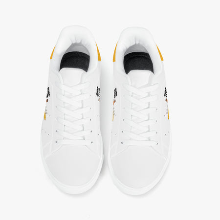 A pair of white low-top sneakers shown from a top-down view on a clean white background. The shoes feature white laces, a black interior lining, and small yellow and black graphic accents on the sides and heel.