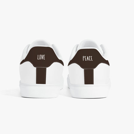 White sneakers with brown accents on a white background