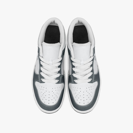 Overhead view of slate blue-grey and white sneakers showing clean white laces, white padded collar lining, and perforated white leather toe boxes.