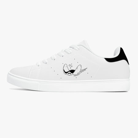A white low-top sneaker with a black graphic of a fish with a mustache and small black stars on the side, featuring a black heel tab, shown against a plain white background.