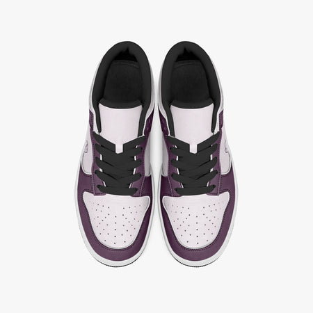 Overhead view of plum purple and pale lilac sneakers showing black laces, black inner collar lining, and perforated toe boxes.
